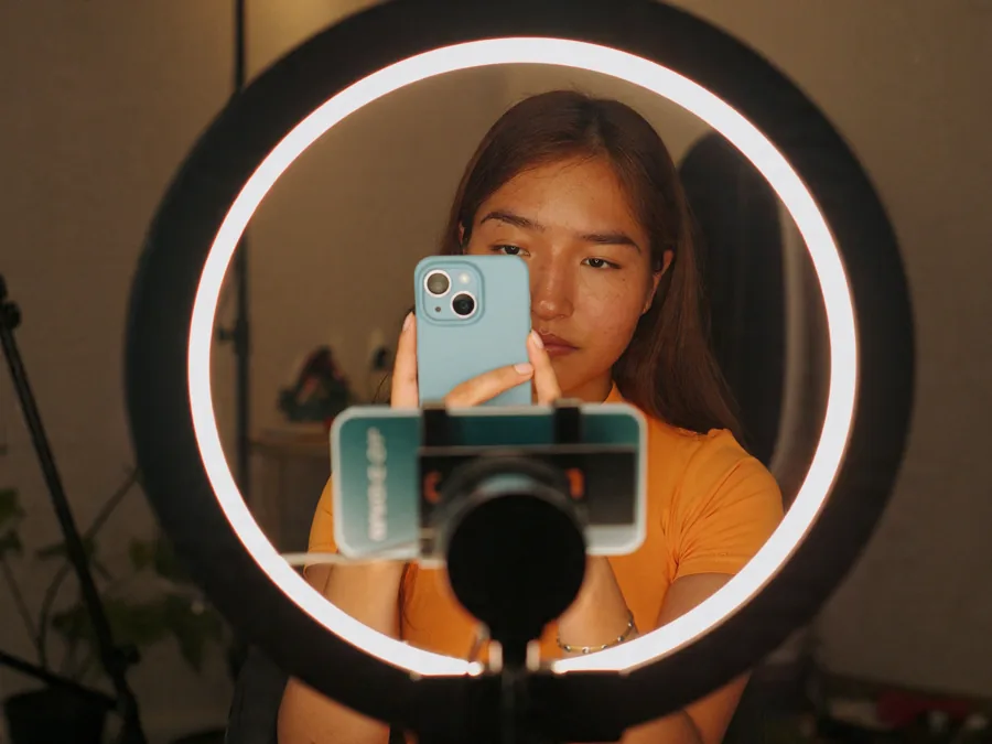 Content creator filming with a phone